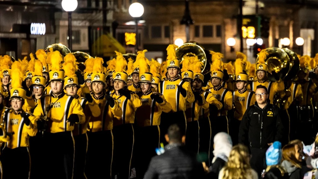 HMB members performing in the 2023 Homecoming parade in downtown Iowa City