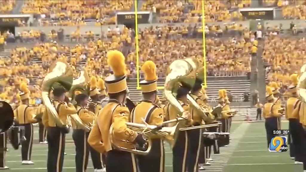 Hawkeye Marching Band performing in Kinnick Stadium