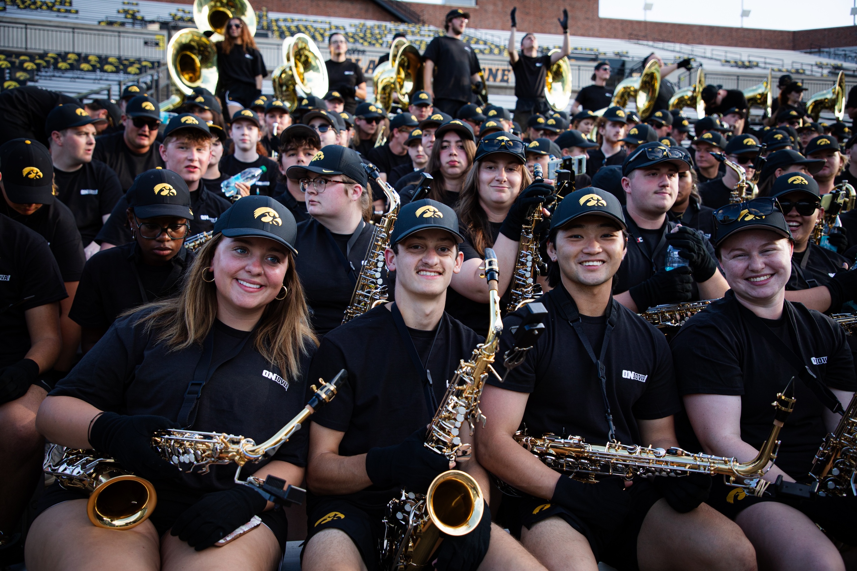 Alto saxophones performing during Kickoff at Kinnick