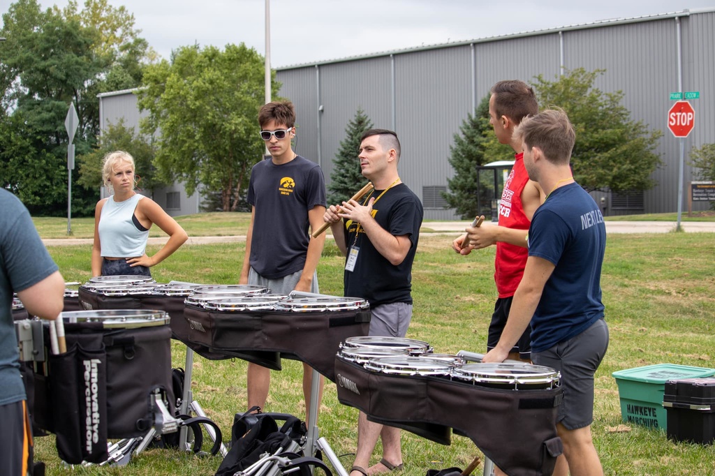Nick Miller working with the Hawkeye Drumline during Band Camp