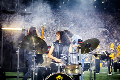 Hawkeye Metal Band performs during Metallica Halftime show in Kinnick Stadium