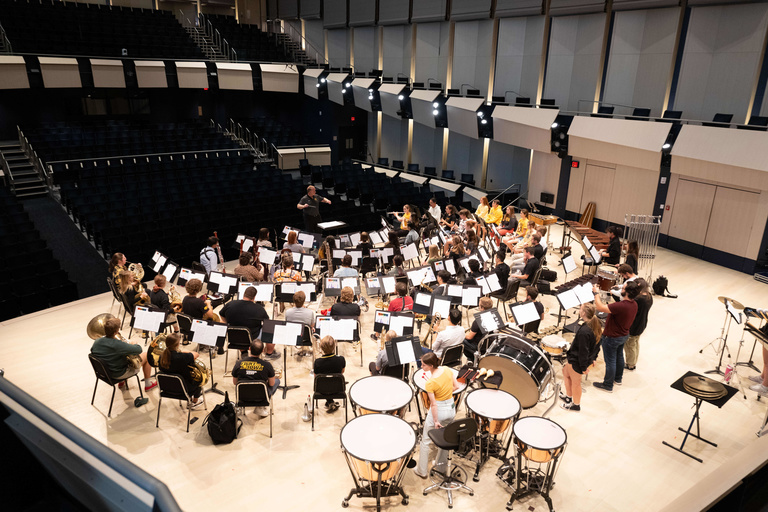 Iowa Symphony Band in rehearsal in the Voxman Concert Hall