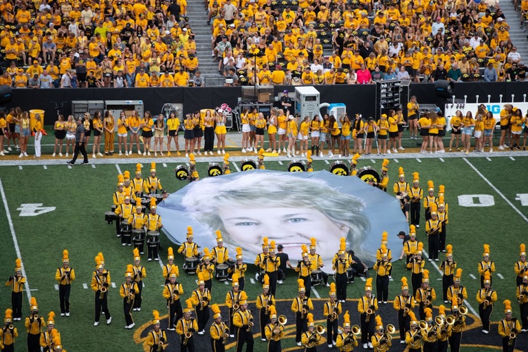  Iowa Marching Band holds up a banner of Lisa Bluder during halftime at a football game between Iowa and Troy at Kinnick Stadium on Saturday, Sept. 14, 2024