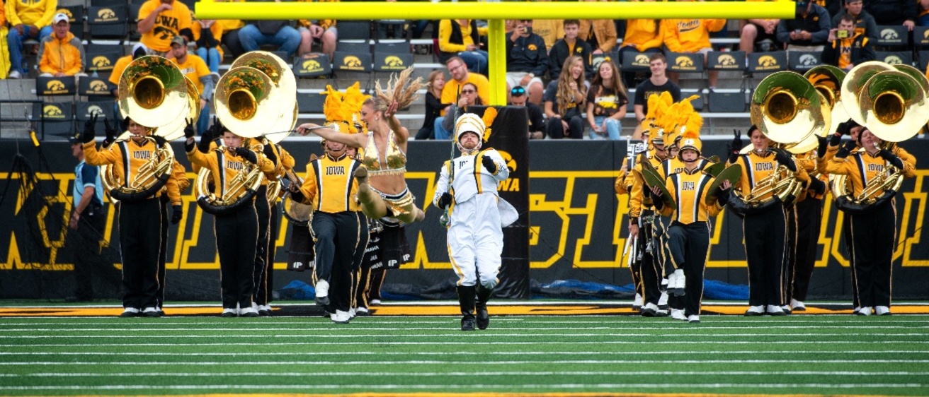 HMB Drumline, Drum Major, and Golden Girl performing in Pregame