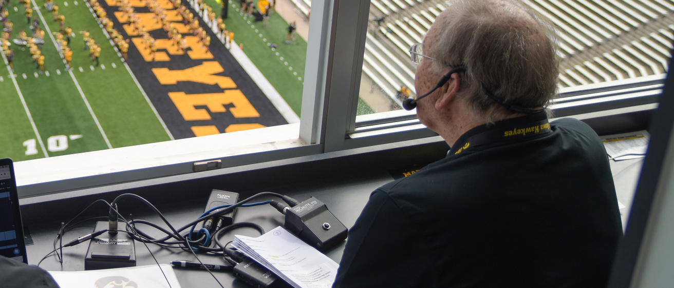 Lou Crist in the Press Box at Kinnick Stadium