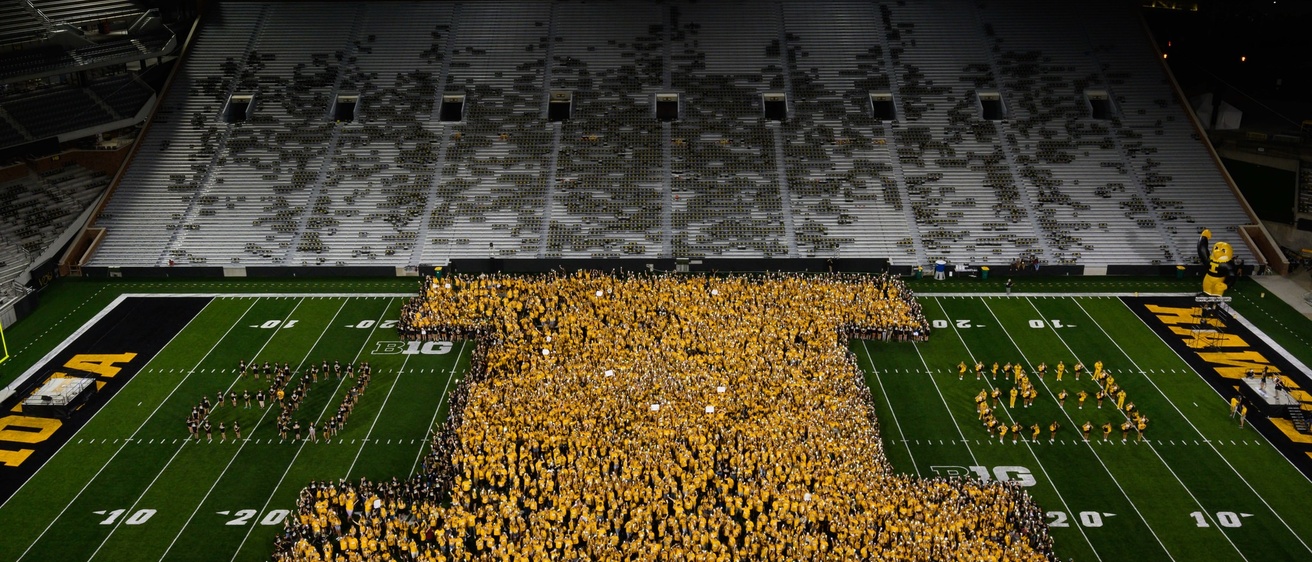 Photo of Block "I" on the field in Kinnick Stadium with "20" on one side and "23" on the other