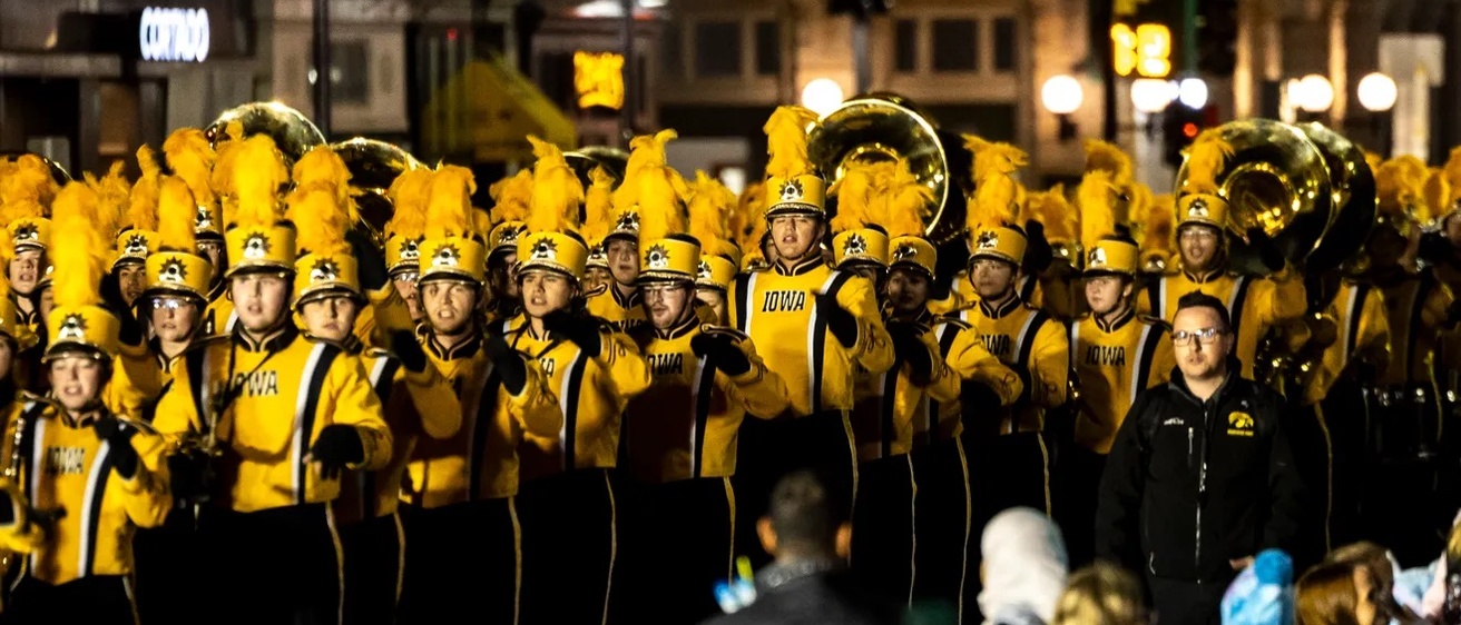 HMB members performing in the 2023 Homecoming parade in downtown Iowa City