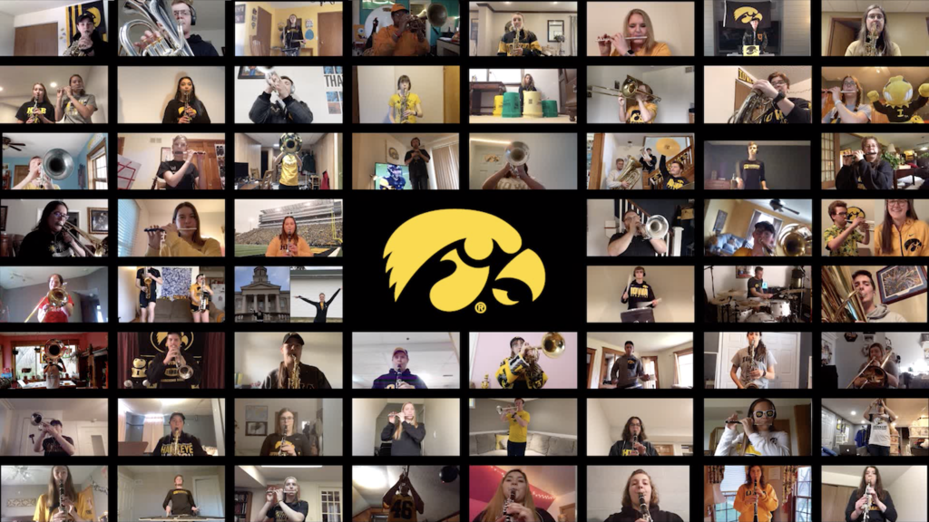 60 members of the Hawkeye Marching Band performing the Iowa Fight Song in a grid of individual video clips