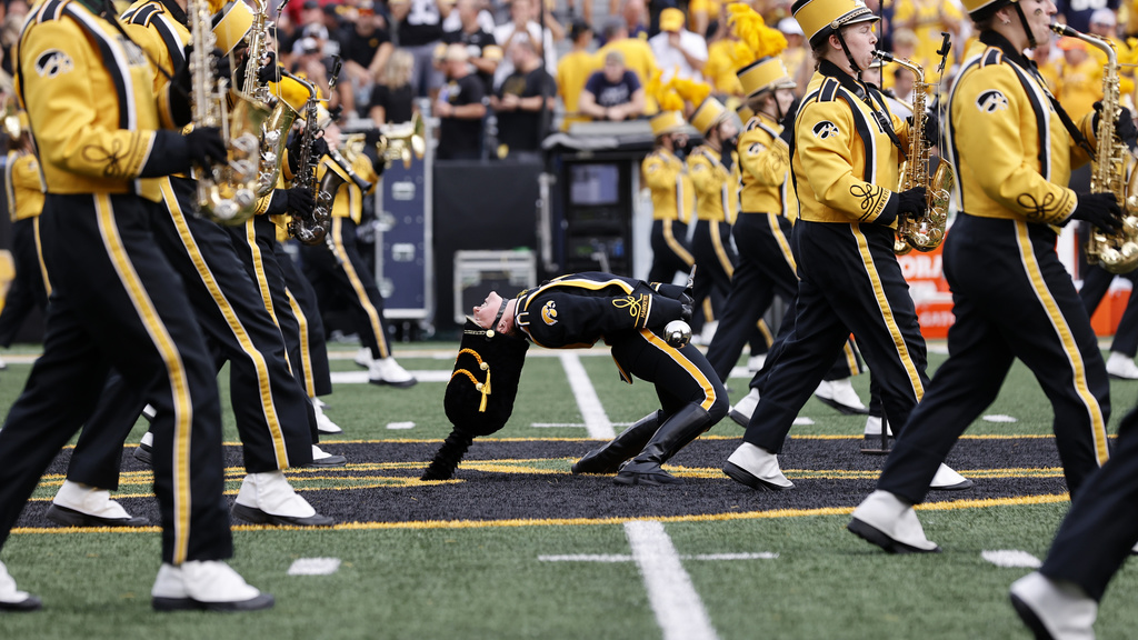 Hawkeye Marching Band performing in Kinnick Stadium