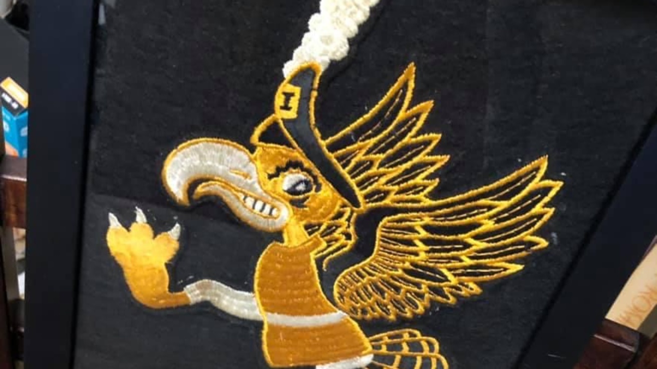 Embroidered Marching Herky graphic on black background