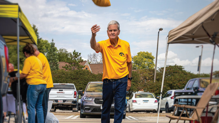 George Scully tosses a beanbag